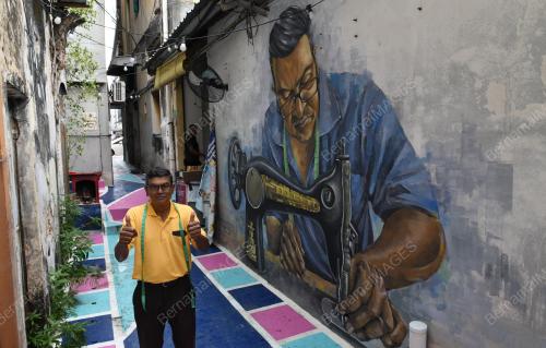 MURAL TUKANG JAHIT