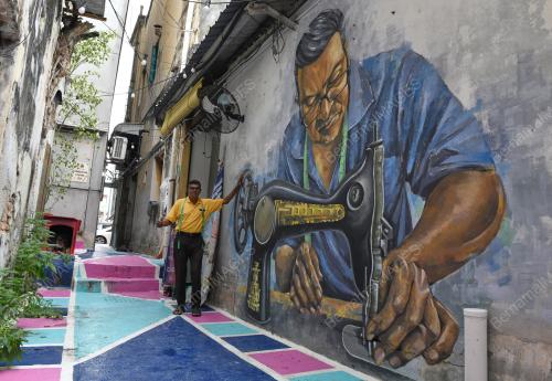 MURAL TUKANG JAHIT