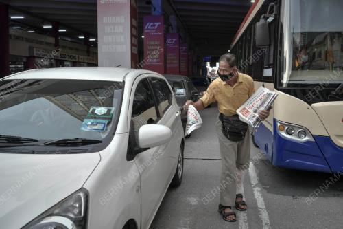 PENJUAL SURAT KHABAR