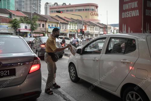 PENJUAL SURAT KHABAR