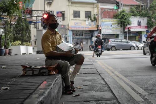 PENJUAL SURAT KHABAR