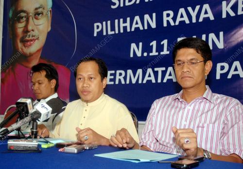 AHMAD MASLAN