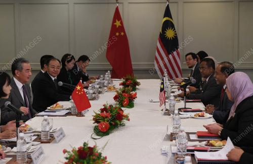 WANG YI