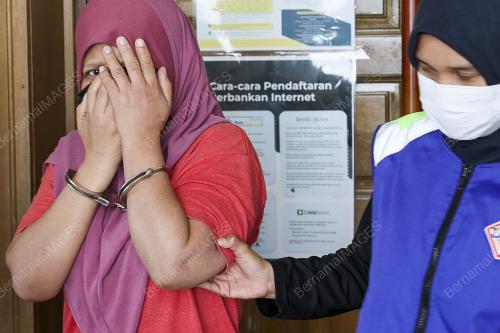 WANITA DIDENDA RM5,000 MILIKI KAD PENGENALAN INDIVIDU LAIN