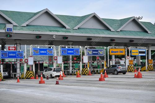 TINJAUAN ALIRAN TRAFIK DI PLAZA TOL IPOH