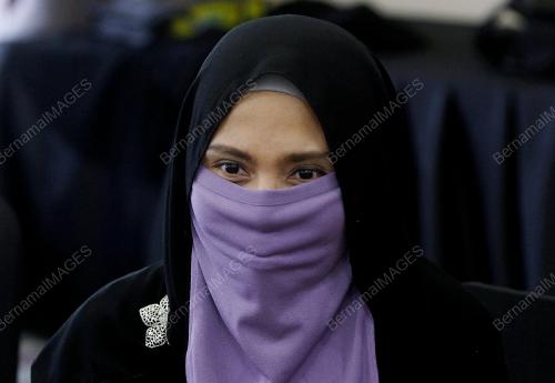 TINA TAJUDDIN