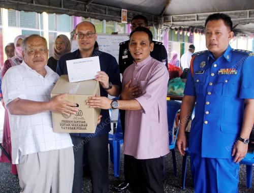 MANGSA BANJIR KILAT DI SAHOM