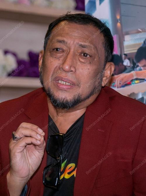 KAMARULZZAMAN AHMAD