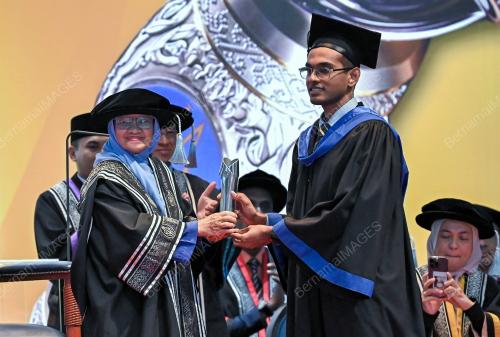 TAN SRI ZAHARAH IBRAHIM
