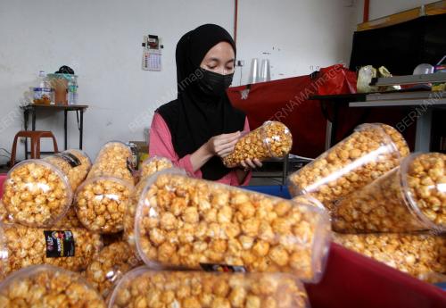 PENGUSAHA PERNIAGAAN POPCORN