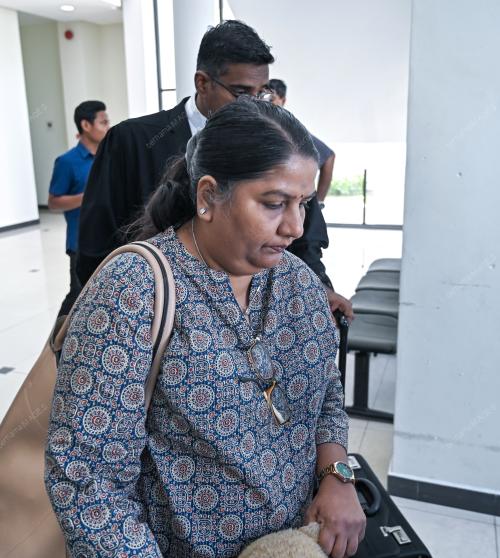 M. INDIRA GANDHI