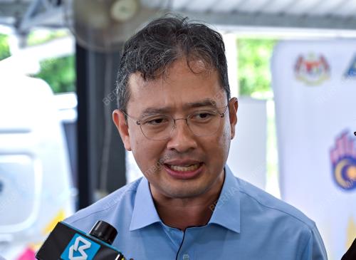 TAN SRI JOHAN MAHMOOD MERICAN