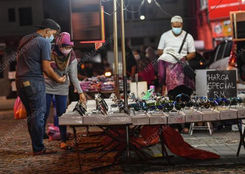 TINJAUAN PEMBUKAAN BAZAR GERBANG MALAM