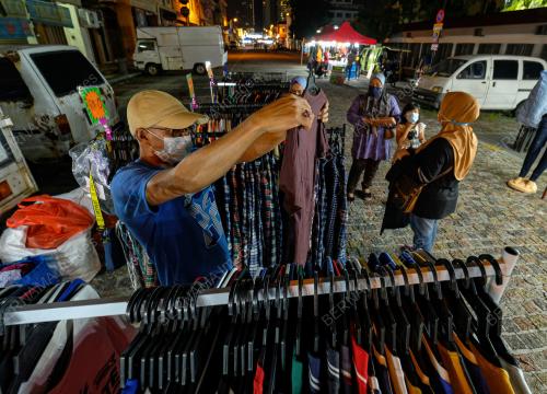 TINJAUAN PEMBUKAAN BAZAR GERBANG MALAM