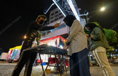 TINJAUAN PEMBUKAAN BAZAR GERBANG MALAM