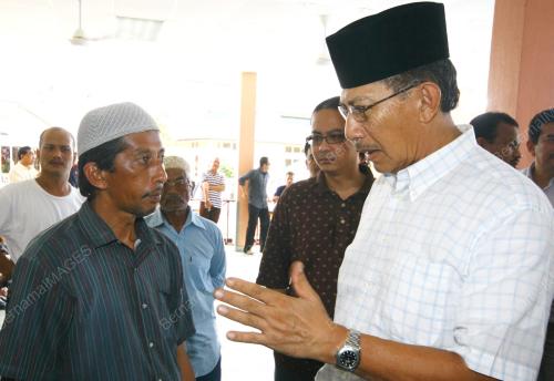 AZMI KHALID