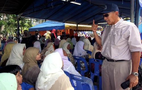DATUK SERI AZMI KHALID