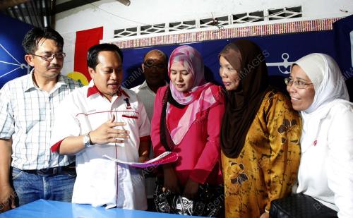AHMAD MASLAN