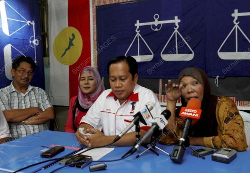 AHMAD MASLAN