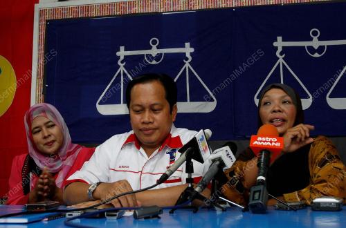 AHMAD MASLAN