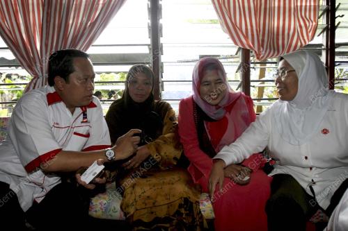 AHMAD MASLAN