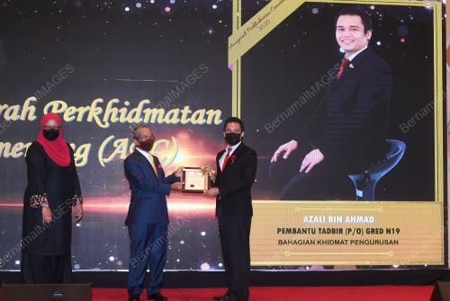 TAN SRI MOHD SIDEK HASSAN