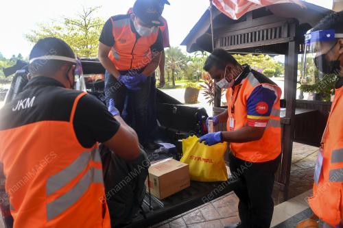 JKM URUS PENGHANTARAN BARANG PESAKIT COVID-19