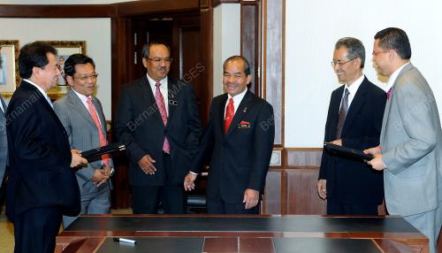 TAN SRI MOHD SIDEK HASSAN
