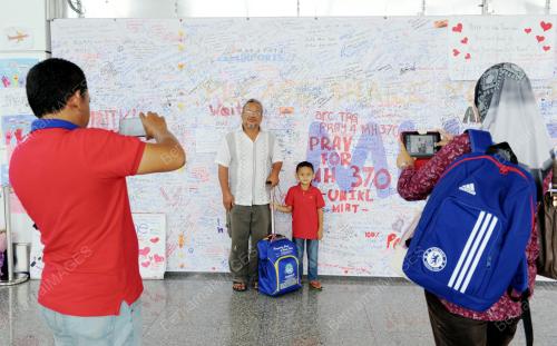 PTJ03_18032014_MH370