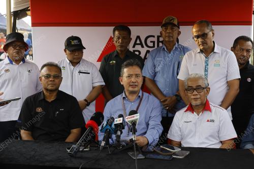 TAN SRI JOHAN MAHMOOD MERICAN