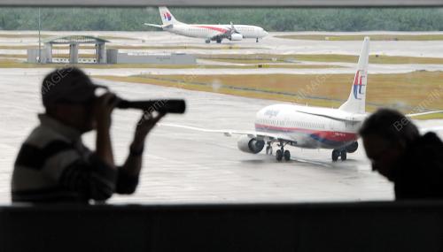 PTJ11_18032014_MH370