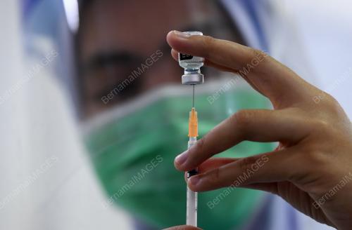 SUNTIKAN IMUNISASI VAKSIN COVID-19