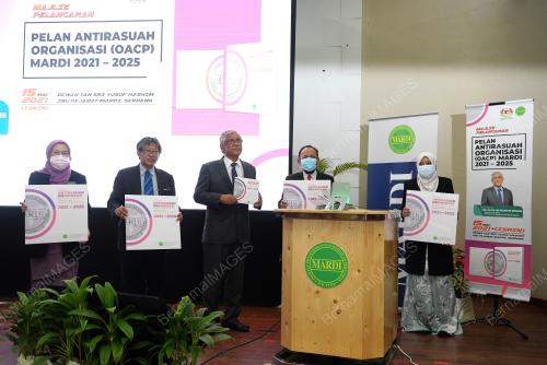 TAN SRI ABU KASSIM MOHAMED