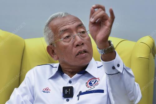 DATUK SERI MAHDZIR KHALID