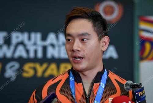 TIMMY TAN