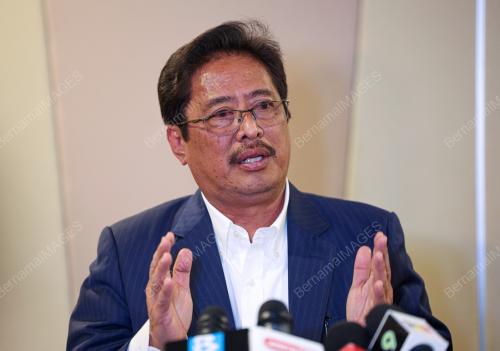 TAN SRI AZAM BAKI