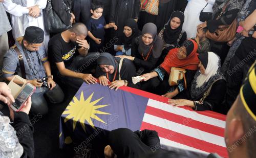 PTJ98_22082014_JENAZAH_MH17_2