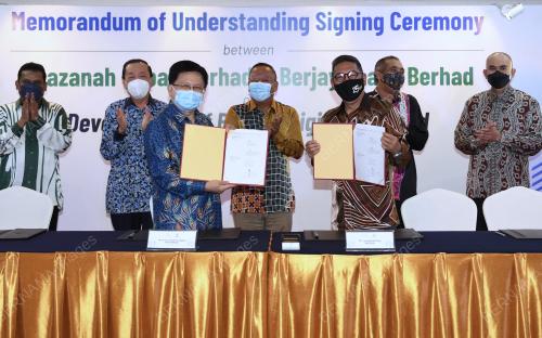 MOU QHAZANAH BHD DAN BERJAYA LAND