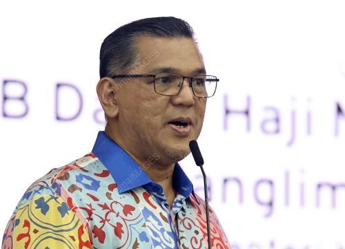 DATUK NIZAM ABU BAKAR TITINGAN