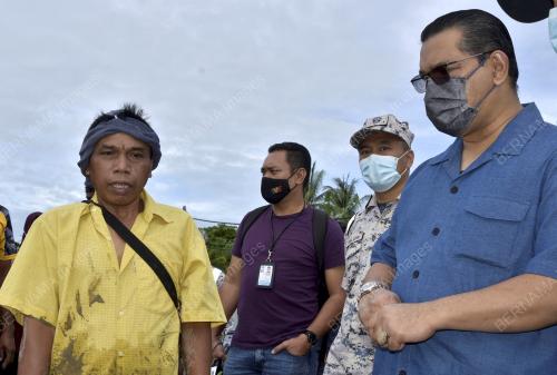 DATUK NIZAM ABU BAKAR TITINGAN