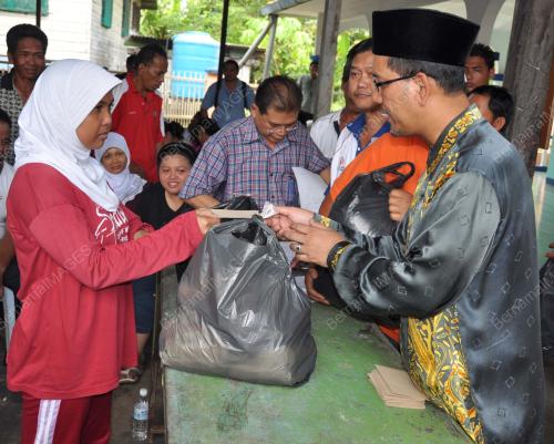 TAWFIQ ABU BAKAR TITINGAN