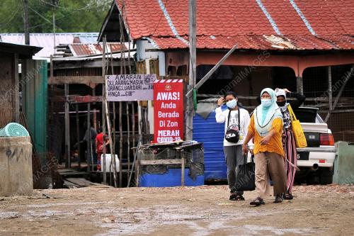 LABUAN ZON MERAH COVID-19