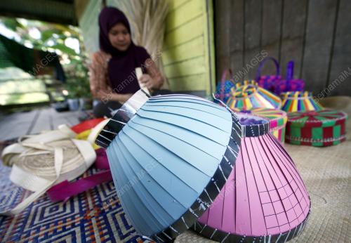 TUDUNG DUANG KOTA BELUD
