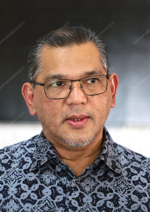 DATUK NIZAM DATUK ABU BAKAR TITINGAN