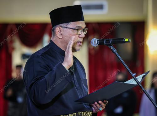 DATUK NIZAM ABU BAKAR TITINGAN