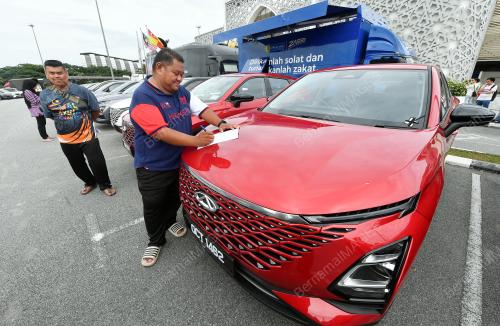 PENYERAHAN KENDERAAN CHERY KEPADA MANGSA KEBAKARAN