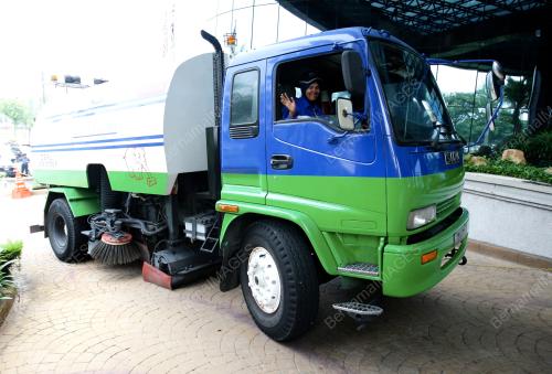FIRST LADY DRIVER ROAD SWEEPER