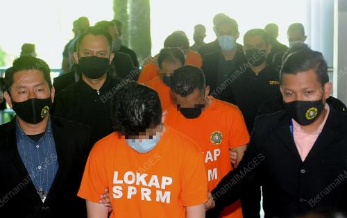 TUJUH INDIVIDU DIREMAN MEMBANTU KES RASUAH BERJUMLAH RM18 JUTA
