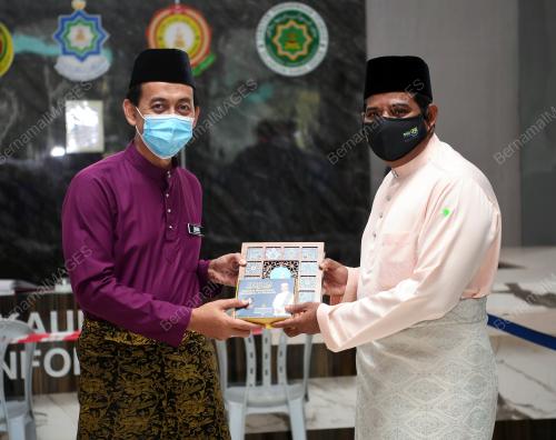 MOHD ZAWAWI AHMAD MUGHNI