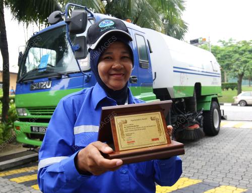 FIRST LADY DRIVER ROAD SWEEPER